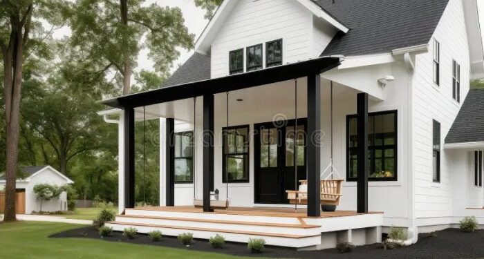 Elegant and Modern Farmhouse Exterior with Black Siding, White Trim ...